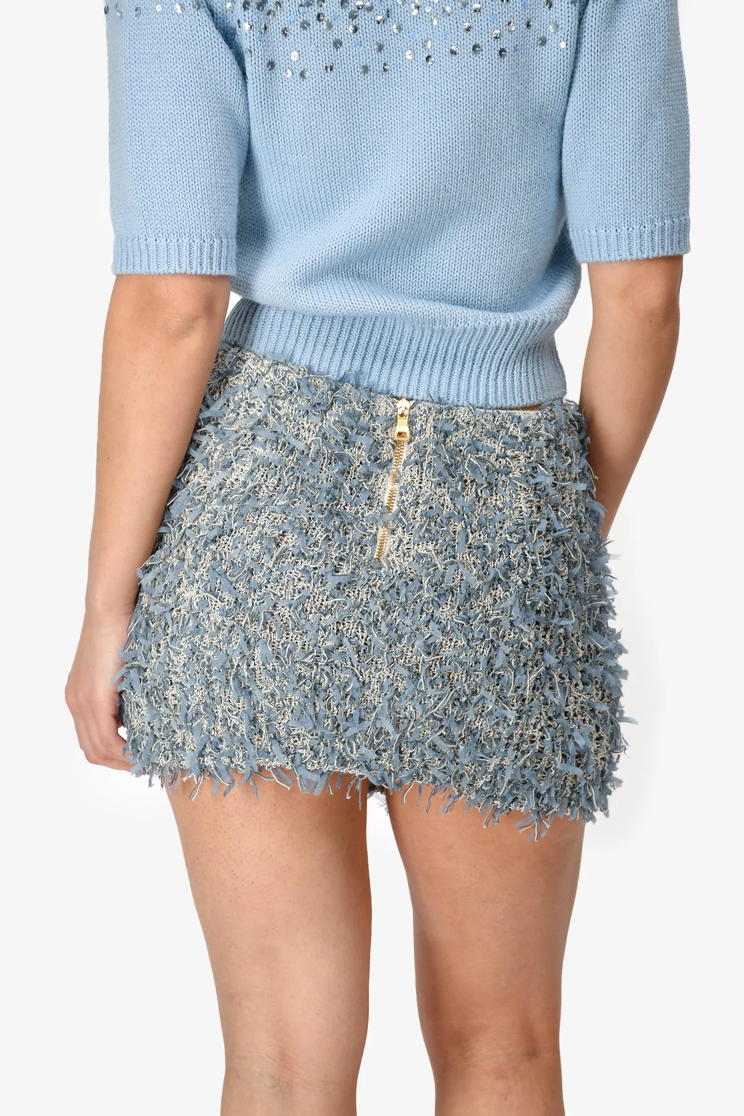 Mini-jupe frangée bleue Balmain avec boutons dorés taille 38