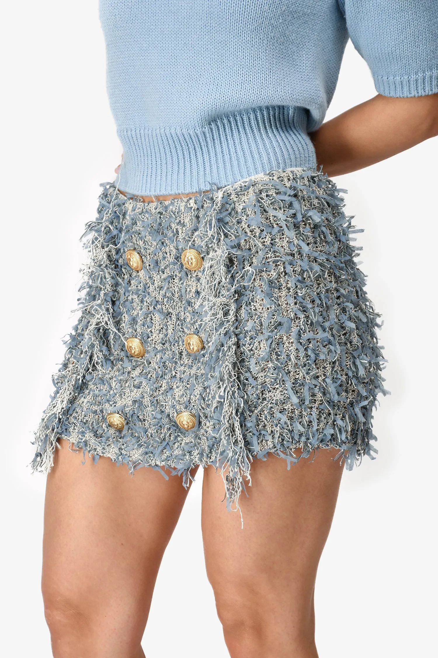 Mini-jupe frangée bleue Balmain avec boutons dorés taille 38