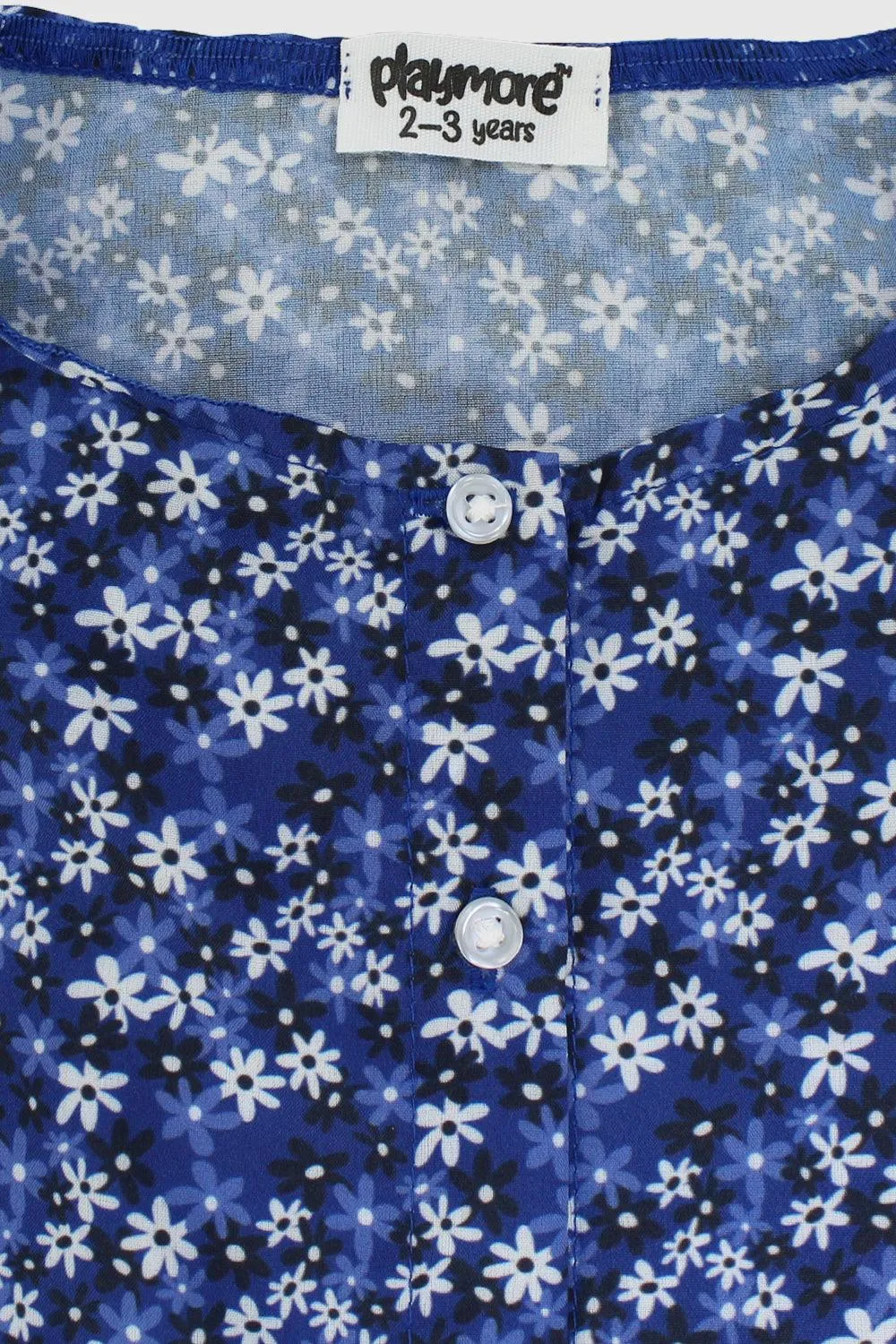Blouse sans manches à motifs floraux bleus