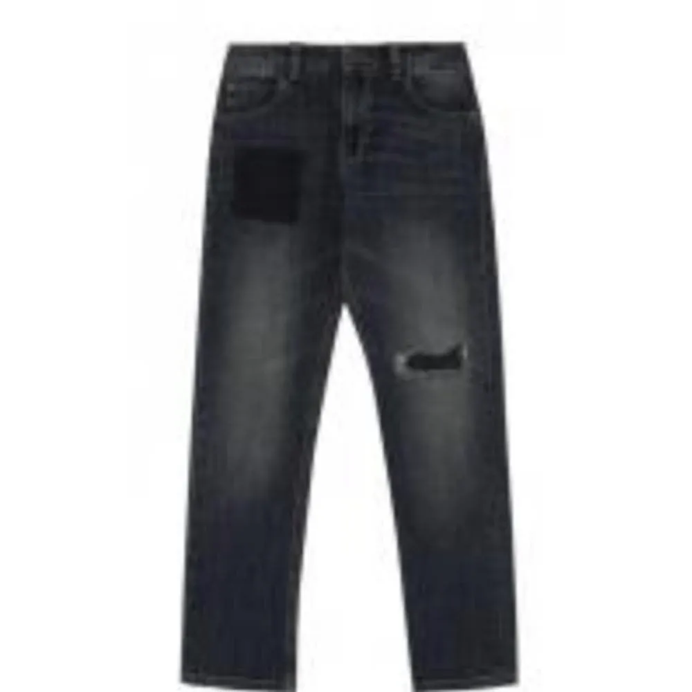 Jeans à pièces denim pour garçons