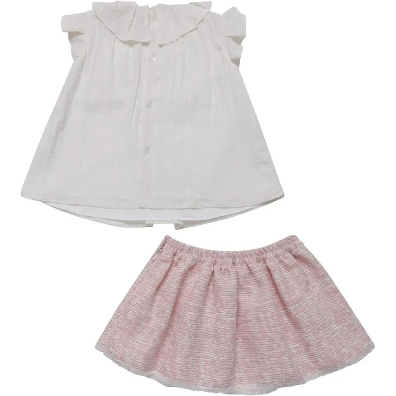 Blouse à volants crème avec jupe texturée rose