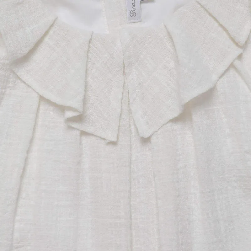 Blouse à volants crème avec jupe texturée rose