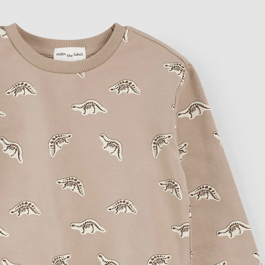 Imprimé fossile de dinosaure sur sweat à capuche taupe par miles the label.