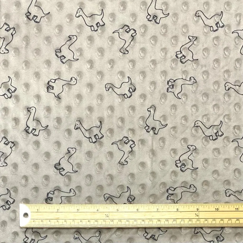 Tissu en polaire à motifs dinosaures
