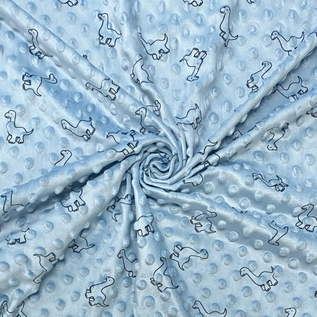 Tissu en polaire à motifs dinosaures