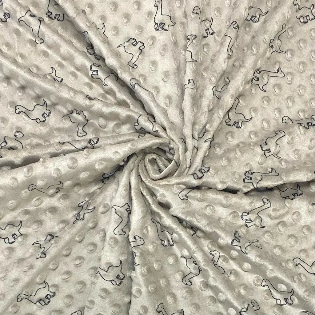 Tissu en polaire à motifs dinosaures