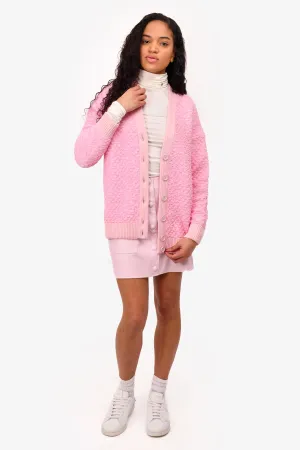 L'Agence Mini-jupe en similicuir rose avec boutons dorés Taille 6