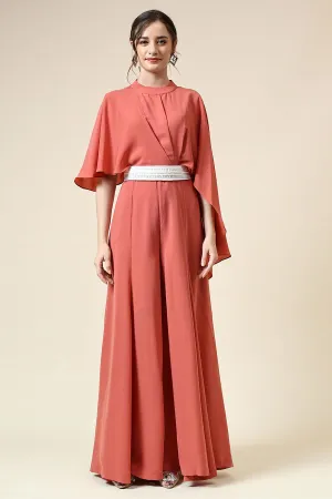 Combinaison orange pastel avec ceinture ornée