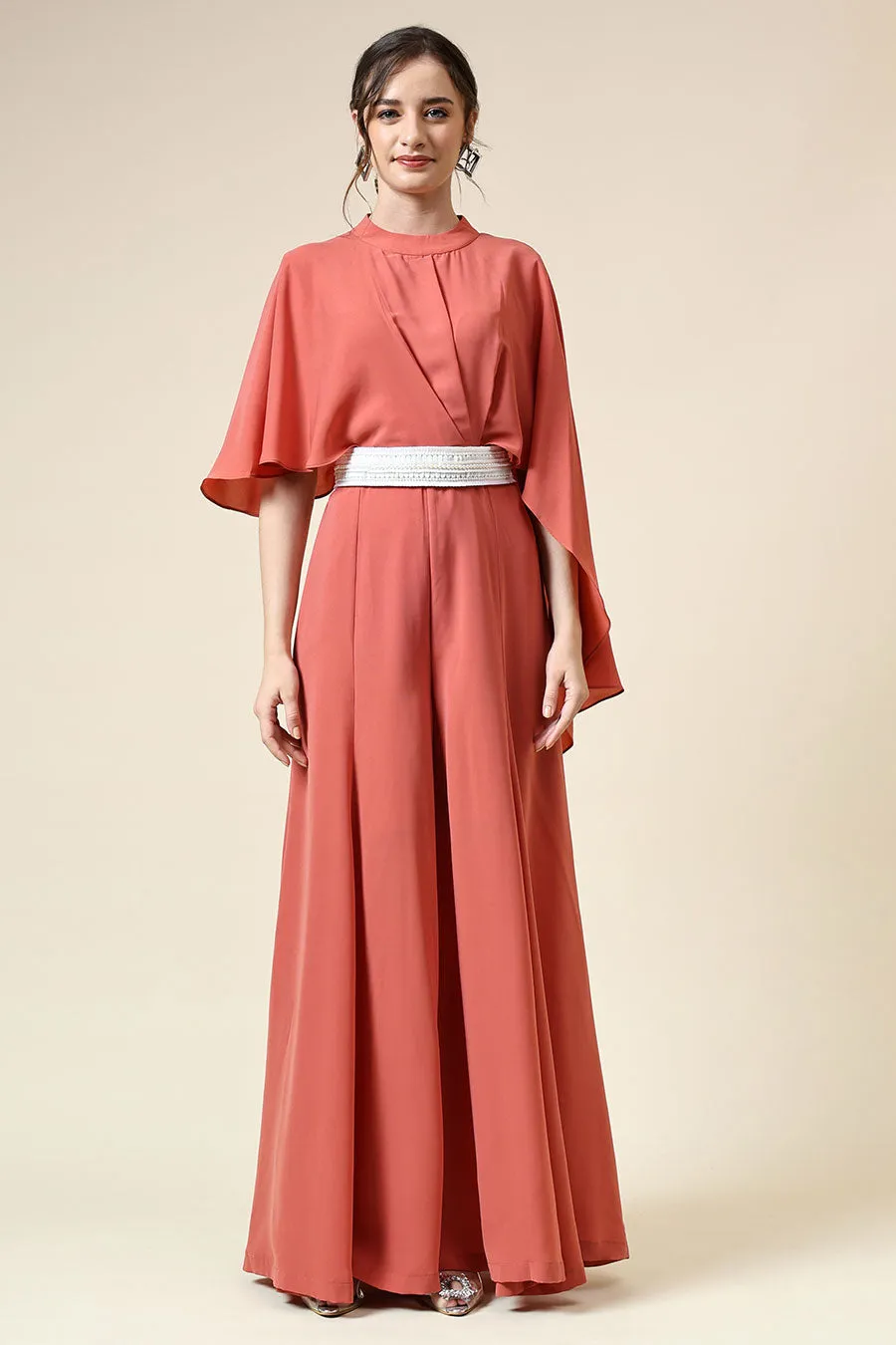 Combinaison orange pastel avec ceinture ornée