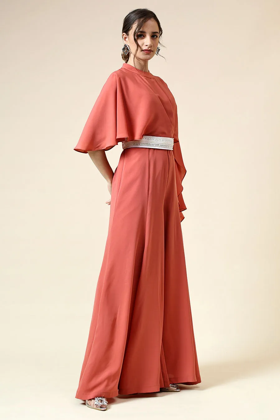 Combinaison orange pastel avec ceinture ornée