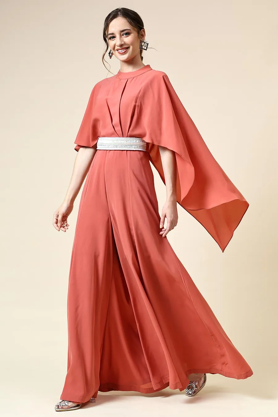 Combinaison orange pastel avec ceinture ornée