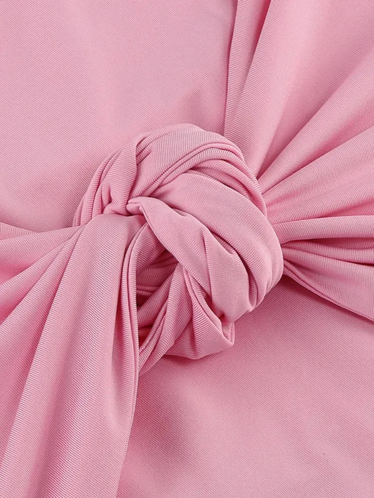Robe maxi rose avec nœuds et découpes