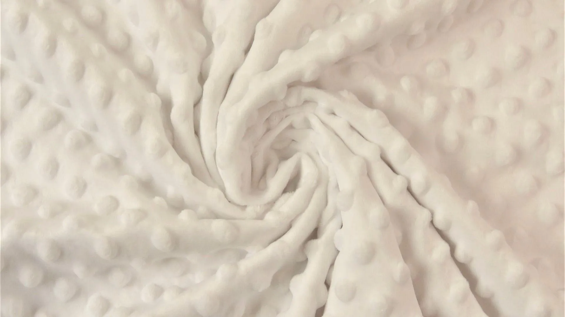Tissu en polaire pelucheux à fossettes