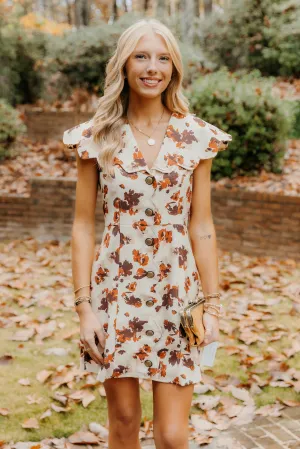 Robe Rowan à motifs floraux avec détails festonnés