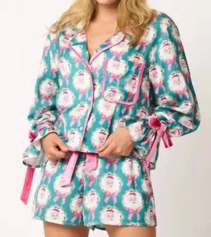 Pyjama à motifs de Père Noël et nœuds en turquoise