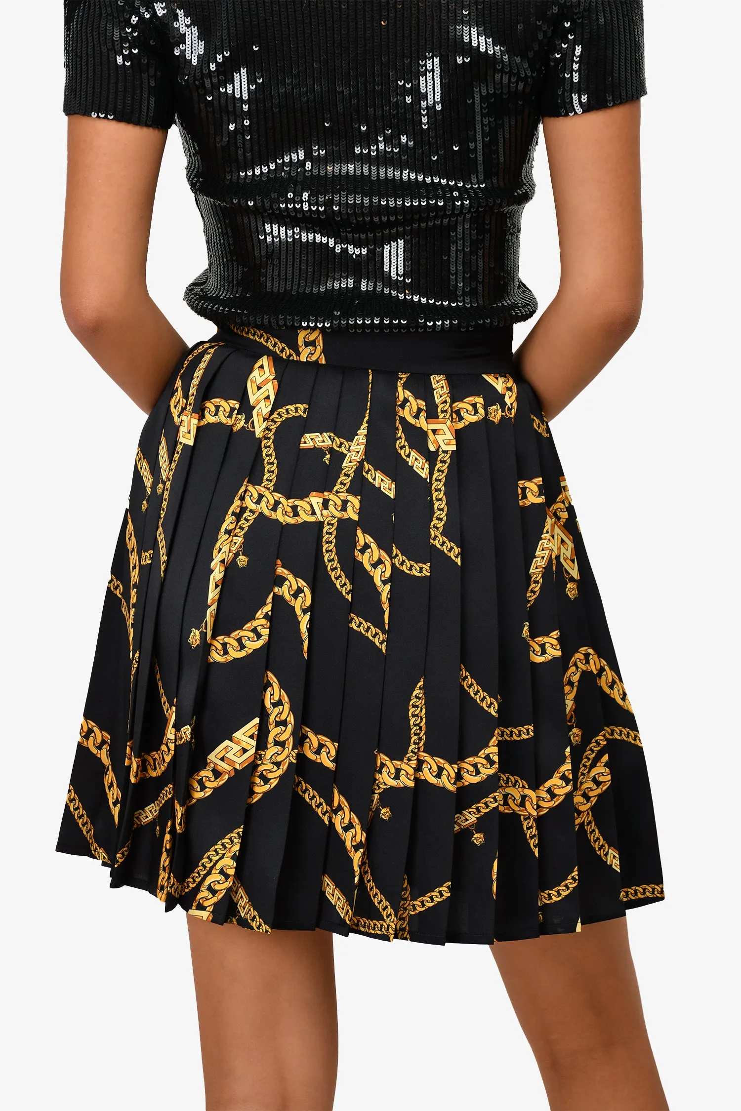 Jupe plissée mini imprimée noir et or Versace taille 36