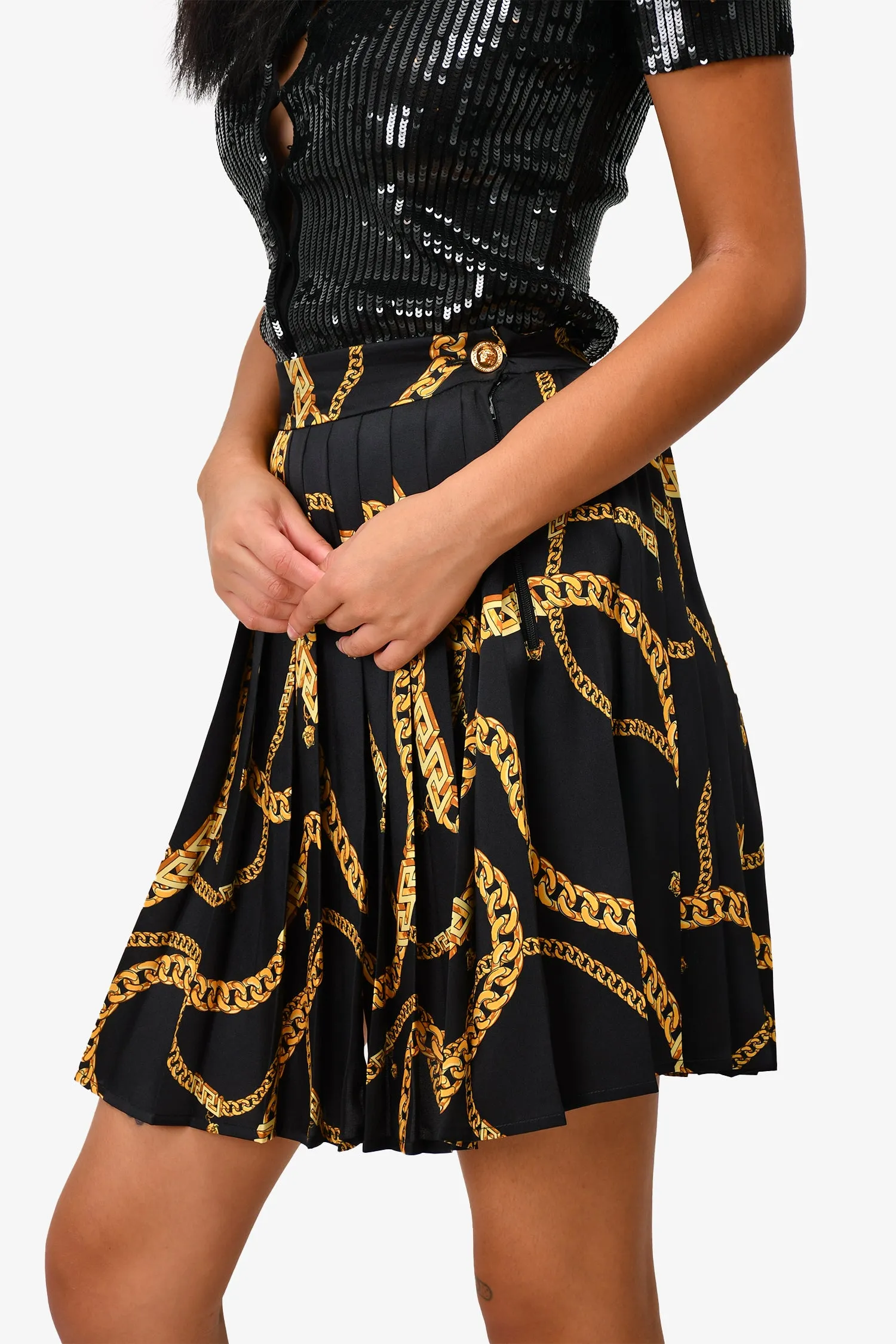 Jupe plissée mini imprimée noir et or Versace taille 36
