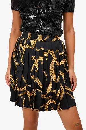 Jupe plissée mini imprimée noir et or Versace taille 36